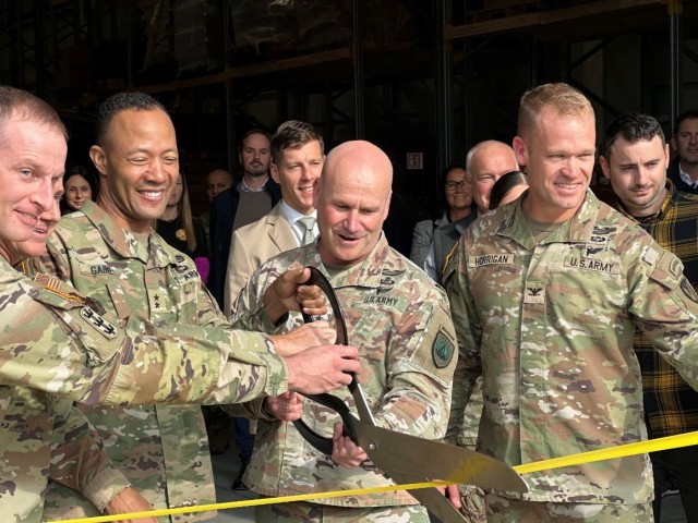 Leaders cut a ribbon Oct. 9 at Aviano Air Base. Pictured (from left to right) are Europe District Deputy Commander Lt. Col. John Kline, U.S. Air Force Brig. Gen. Tad Clark, 31st Fighter Wing commander, Maj. Gen. Andrew Gainey, Commander, U.S. Army...