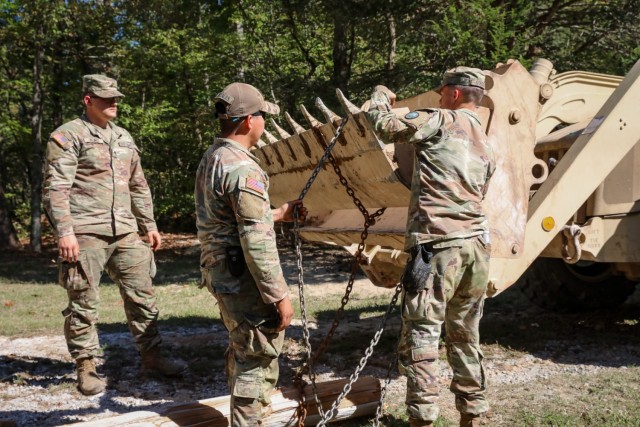 North Carolina National Guardsmen with the 113th Sustainment Brigade and the 30th Armored Brigade Combat Team conduct bridge-building operations in Nebo, N.C., Oct. 9, 2024, to connect roads for residents following Tropical Storm Helene. (U.S....