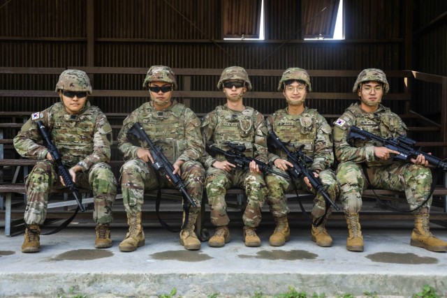 Korea Augumentation to the United States (KATUSAs) carry M4's at Apache Range during qualification training at Camp Casey, South Korea, Oct. 17, 2024. Qualifying with the M4 built confidence, improved marksmanship skills, and ultimately enhanced a...