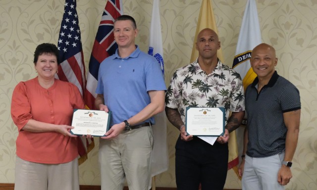 USAG Humphreys Commander, Col. Ryan K. Workman and Command Sgt. Maj. Monty C. Drummond accepted an Army Commendation Medal on behalf of Sgt. Laurengregg E. Rimalos as the USAG Humphreys BOSS President, and a Civilian Service Commendation Medal on...