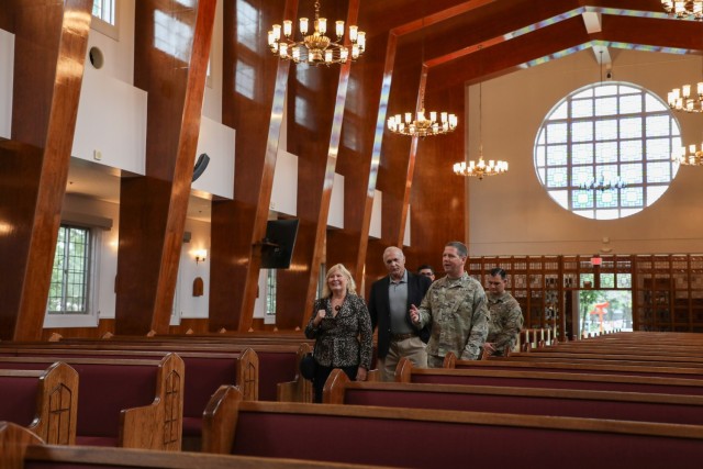 Trudy Floyd, who was born on Camp Zama in 1959, and her husband, Ron Cox, receives a tour of the chapel at Camp Zama, Japan, Oct. 25, 2024. U.S. Army Garrison Japan organized a tour for Floyd, who wanted to reconnect with her birthplace after her...