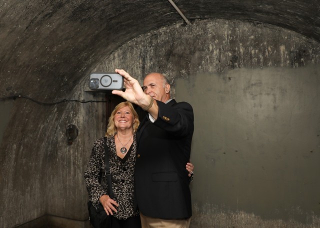Trudy Floyd, who was born on Camp Zama in 1959, and her husband, Ron Cox, take a photo while inside the Emperor's Bunker at Camp Zama, Japan, Oct. 25, 2024. U.S. Army Garrison Japan organized a tour for Floyd, who wanted to reconnect with her...