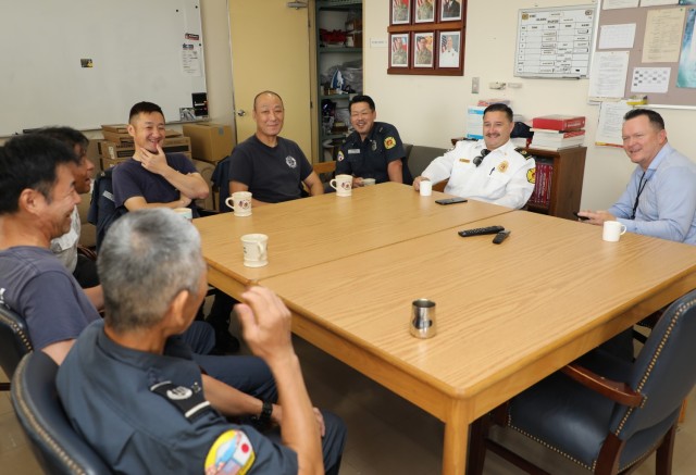 Eishin Marumoto, center, a U.S. Army Garrison Japan fire alarm dispatcher, chats with fellow firefighters inside the Akizuki Ammunition Depot fire station in Japan Sept. 5, 2024. Marumoto has a strong passion for coffee that he likes to share with...