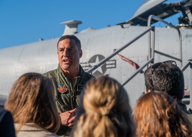 Maryland Air National Guard Brig. Gen. Drew E. Dougherty, assistant adjutant general-air of the Maryland National Guard, speaks with members of the U.S. State Department’s International Visitor Leadership Program during a visit at Martin State...