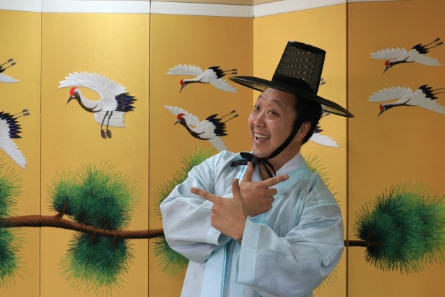 Byron Ellison, a U.S. Army Garrison Yongsan-Casey security specialist, dons a hanbok during a Newcomers Cultural Awareness and Immersion Tour hosted by Dongducheon city, South Korea, Dec. 13, 2024. The tour included a trip to General Eo, Yu-so's...