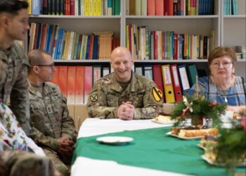 Sharing holiday traditions, 1st Cavalry Division visits local Polish school in Wysoka