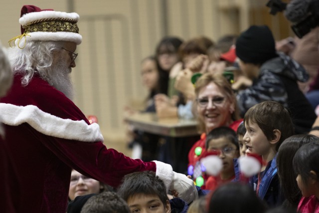 Approximately 50 Alaska National Guard service members, volunteers from the Salvation Army, AKNG Child and Youth Program and others visited the southeastern Alaskan city of Yakutat, Dec. 18, 2024. Operation Santa Claus, a longstanding annual...