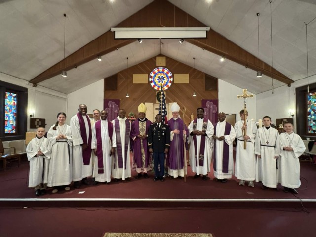 Chaplain (Col.) John Ijeoma (center), U.S. Army Garrison Stuttgart deputy command chaplain, stands flanked by Bishop Thomas Obiatuegwu (center-left), auxiliary bishop of the diocese of Orlu, Nigeria, and Bishop William Muhm (center-right),...