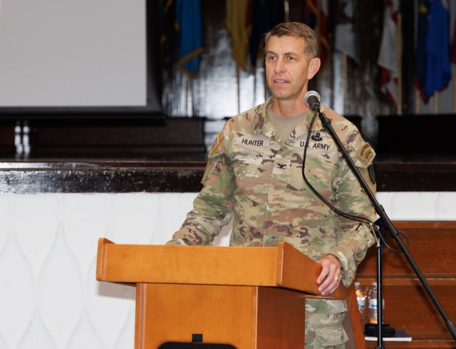 Col. Marcus Hunter, U.S. Army Garrison Japan commander, provides remarks during a workforce town hall at Camp Zama, Japan, Dec. 3, 2024.