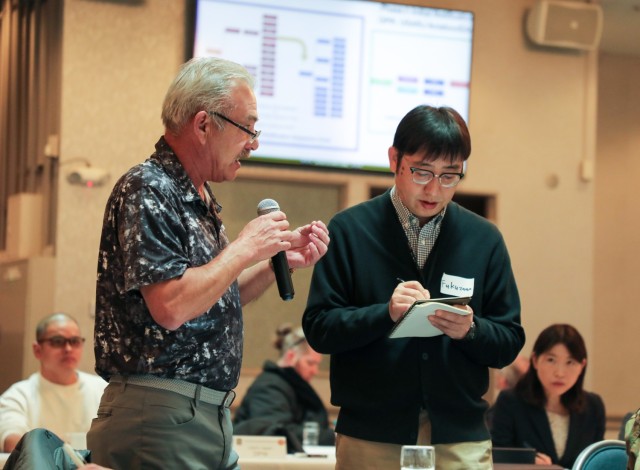 Lyod Black II, left, chief of the Kastner Airfield air control tower, speaks during a downed aircraft exercise at Camp Zama, Japan, Jan. 28, 2025. More than 50 representatives from across U.S. Army Garrison Japan, U.S. Army Japan, South Kanto...