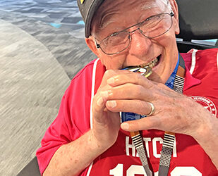 Paralyzed at 79, competing at 83