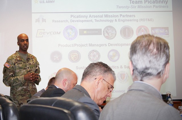 PICATINNY ARSENAL, N.J. - Picatinny Arsenal Garrison Commander, Lt. Col. Craig A. Bonham II, briefs Picatinny Arsenal leadership and congressional staffers, April. 4.