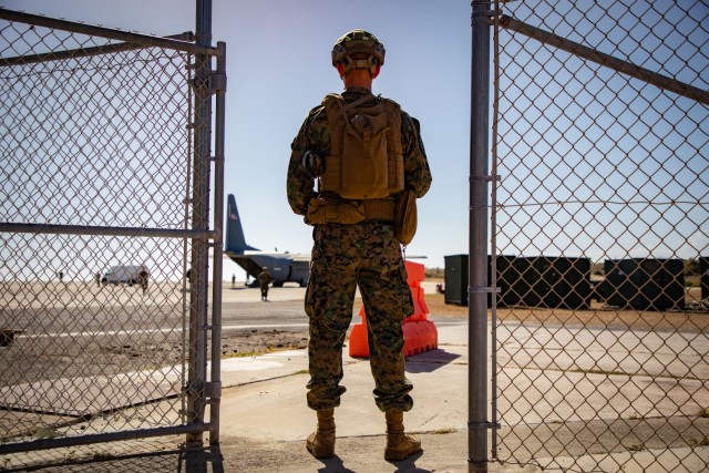U.S. service members support interagency partners escorting illegal aliens as part of Operation Southern Guard at Naval Station Guantanamo Bay, Cuba, Feb. 14, 2025. Joint Task Force Southern Guard is supporting illegal aliens holding operations...