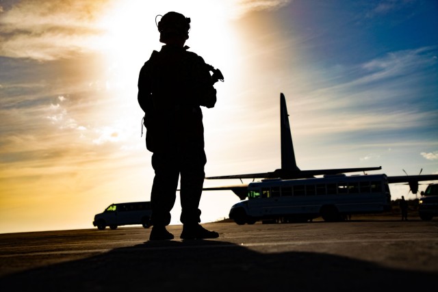 U.S. Service Members support interagency partners escorting illegal aliens as part of Operation Southern Guard at Naval Station Guantanamo Bay, Cuba, Feb. 10 2025. Joint Task Force Southern Guard is supporting illegal aliens holding operations led...