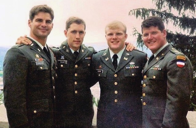 Steve Delity poses with his fellow 1985 United States Military Academy graduates in August 1989, after attending the funeral of their classmate and friend, Capt. Robert Wilson. Wilson died while a passenger in a Blackhawk helicopter during...