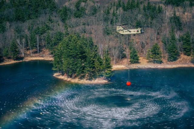 Minnesota National Guard Aviators from the 34th Combat Aviation Brigade conduct their annual Operation Burn Out with the Minnesota Department of Natural Recourses with UH-60 Blackhawk helicopters and CH-47 Chinook Helicopters at Camp Ripley...