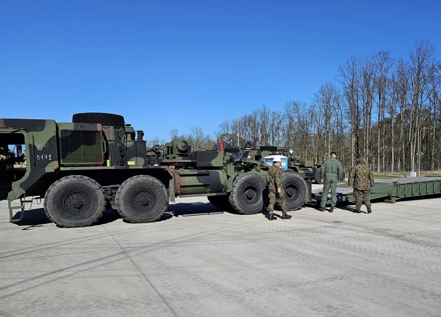 Polish servicemembers train on loading, moving U.S. Army APS-2 heavy construction vehicles