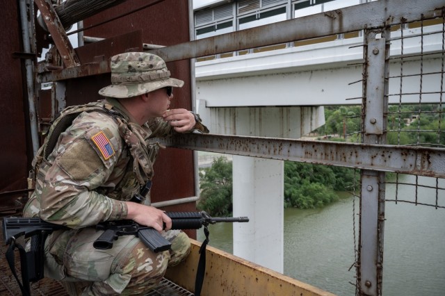 A U.S. Soldier with the Texas Army National Guard monitors activity along the Rio Grande during a patrol near Roma, Texas, April 24, 2025. Texas Army Guard members are part of Operation Lone Star, working alongside U.S. Border Patrol agents to...