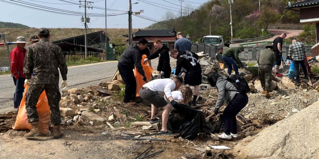 Soldiers from CTF-Defender joined with Republic of Korea Army Soldiers and villagers to conduct a cleanup around Soseong-ri, April 17, 2025