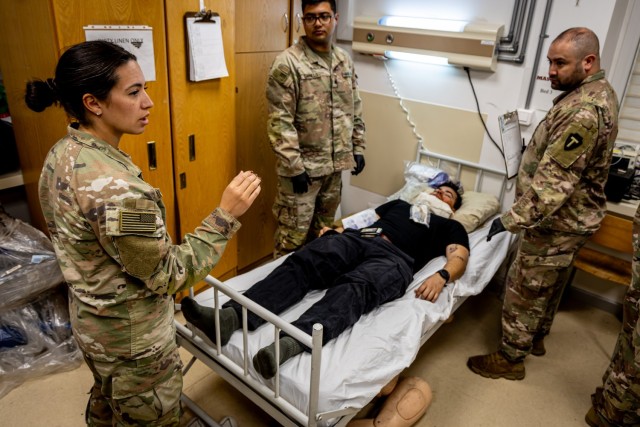 U.S. Army 1st Lt. Isabel Mantooth, a medical officer with the 162nd Medical Company – Area Support, briefs her team as they begin receiving simulated casualties in the triage area during an emergency services exercise in Powidz, Poland, May 15,...
