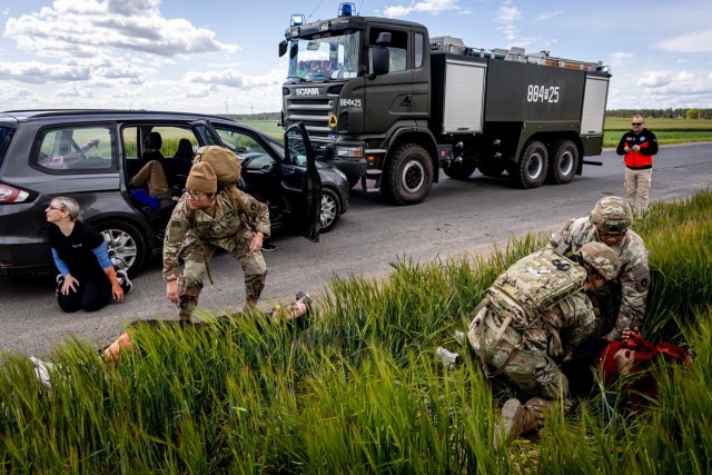 U.S. Army medics from the 162nd Medical Company – Area Support arrive on scene to respond to simulated casualties during an emergency services exercise in Powidz, Poland, May 15, 2024. The medics provided triage and treatment during a staged...