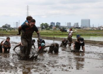Rice-planting event near Camp Zama forges bond with neighboring community