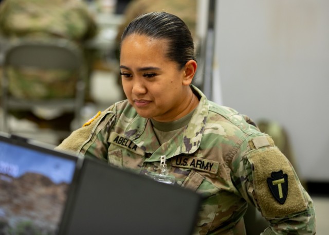 1st Lt. Karina Abella, a cyber operations officer from the 72nd Brigade Combat Team with the Texas Army National Guard, monitors the systems through her computer during exercise Cyber Shield 2025 in Virginia Beach, Virginia, June 9, 2025. Cyber...