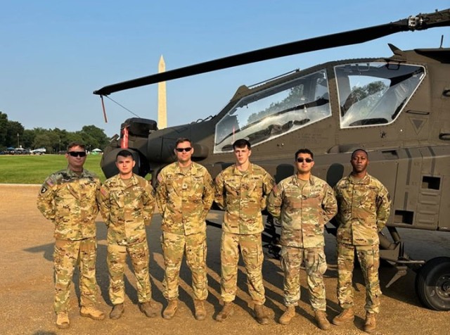 Crew members from the 1-130th Attack Battalion, North Carolina Army National Guard, support a static display during the U.S. Army's 250th birthday celebration on the National Mall in Washington, D.C., Saturday, June 14, 2025. The event honors...