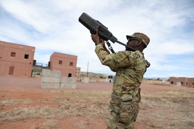 U.S. Army Staff Sgt. Chadley Simms, infantryman, 1st Battalion-157th Infantry (Mountain), Colorado Army National Guard, uses handheld counter-unmanned aerial system equipment to neutralize a simulated drone threat during a drone warfare...