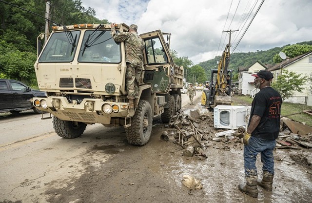 West Virginia National Guard Adjutant General Maj. Gen. Jim Seward visits with Guard members activated on flood response duty in Ohio County, West Virginia, on June 17, 2025. West Virginia Governor Patrick Morrisey declared a state of emergency...