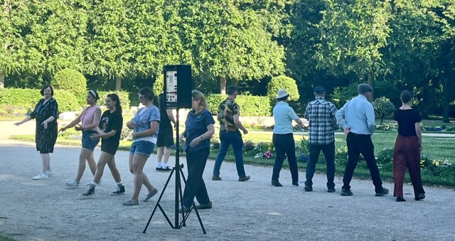 Members of the USAG Ansbach community — including Soldiers, civilian employees, and students — practice their dance steps in preparation for the City of Ansbach's 75th Rococo Festival.