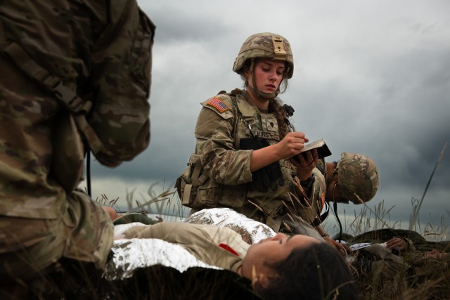 U.S. Army Spc. Meadow Wilkins with Charlie Company, 181st Brigade Support Battalion, 81st Stryker Brigade Combat Team, Washington National Guard, triages a patient during mass casualty training at Yakima Training Center, Wash., July 20, 2025. Mass...