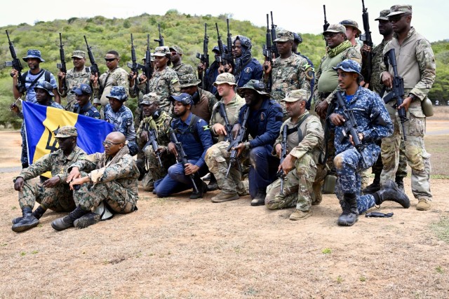 Soldiers from the D.C. National Guard, Barbados Defence Force Reserves, Jamaica Defence Force, and Jamaica National Reserve hone marksmanship skills at Twickenham Park Range in St. Catherine, Jamaica, on July 17, 2025. As part of the Caribbean...