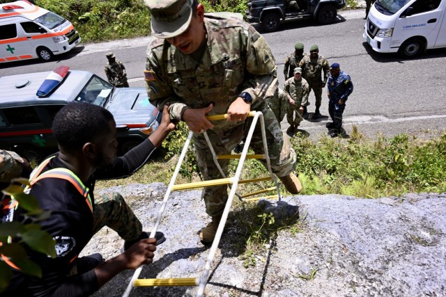 Maj. Gen. John Andonie, Commanding General (Interim) for the DC National Guard, practices rappelling techniques at Moneague Training Camp, St. Ann, during a senior leader visit to Jamaica, on July 18, 2025. The D.C. National Guard's...