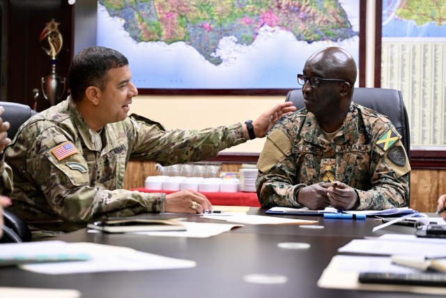 Maj. Gen. John Andonie, Commanding General (Interim) for the DC National Guard, meets with Brig. Ricardo Blidgen, Commander of the Jamaica National Reserve, during his to visit to the Caribbean Regional Training Camp in Kingston, Jamaica, July...