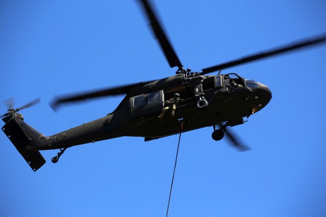 A UH-60 Blackhawk Helicopter from Charlie Company, 1st Battalion, 140th Aviation, 96th Troop Command, Washington Army National Guard conducts water bucket training with Central Pierce Fire and Rescue, June 30, 2025, near Puyallup, Wash. (U.S....