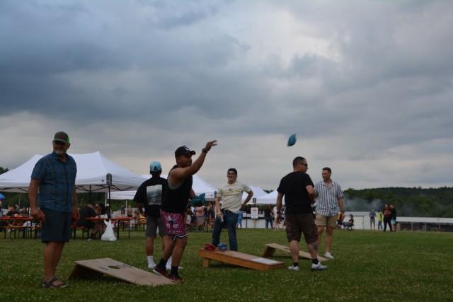 People play cornhole