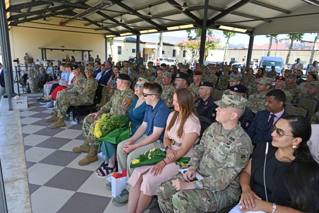 VICENZA, Italy - Soldiers and family members gathered July 9, 2025, at Caserma Ederle in Vicenza, Italy, for the U.S. Army Garrison Italy, of incoming Col. Vaughn D. Strong Jr. and outgoing Col. Scott W. Horrigan, during change of command...