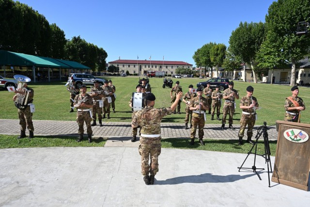 VICENZA, Italy - Italian Army Fanfara of the Brigata di Cavalleria “Pozzuolo del Friuli” sounds, during U.S. Army Garrison Italy change of command ceremony at Caserma Ederle, Vicenza, Italy July 9, 2025. During the ceremony, Col. Scott W....
