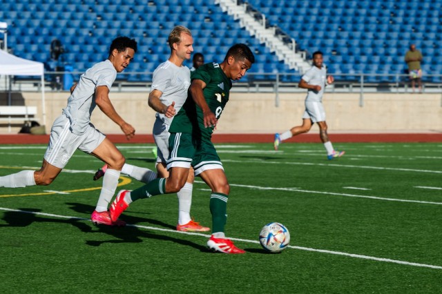 Army winger, Pfc. Devan Mendiola dribbles upfield against the All-Air Force team in the 2025 Armed Forces men's soccer championship game on July 30.