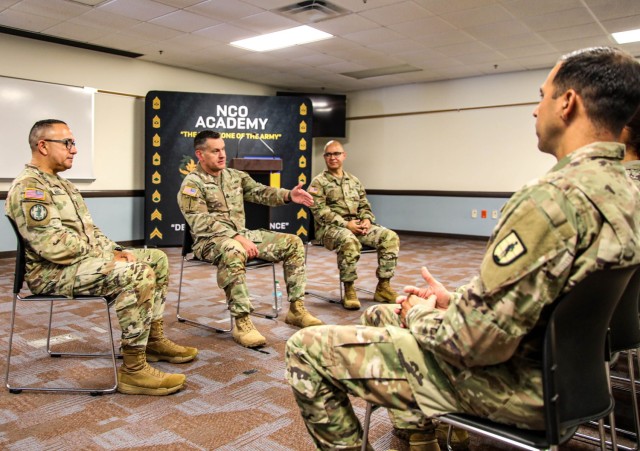 Sgt. Maj. of the Army Michael R. Weimer, converses with Soldiers during a visit to the Puerto Rico National Guard’s headquarters at Fort Buchanan, Puerto Rico, Aug. 4, 2025.