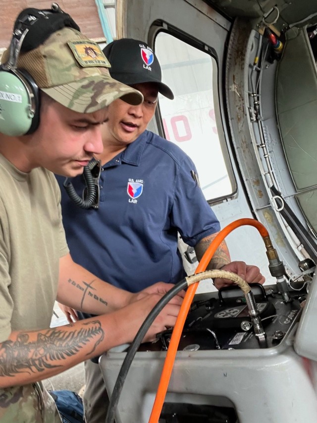 SUBIC BAY, Philippines (May 2025) – Mr. Junior Samia, an Aviation and Missile Command (AMCOM) Logistics Assistance Representative, mentors Soldiers assigned to the 25th Infantry Division’s Combat Aviation Brigade during UH-60 Black Hawk phase...