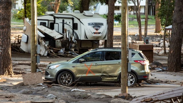 U.S. National Guard Soldier helps rescue 8 people from a flooded home.
